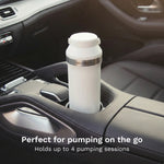 White breastmilk storage cooler in a car cup holder with text 'Perfect for pumping on the go' and 'Holds up to 4 pumping sessions'. - product thumbnail