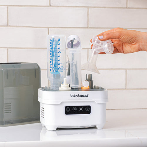 Sterilizer Dryer Mini - جهاز تعقيم وتجفيف محمول مثالي للسفر والمساحات الصغيرة ومحطات الشفط Baby Brezza ME - product thumbnail