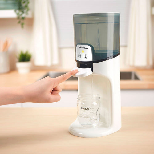 EN Baby Brezza Instant Water Warmer dispensing water with a touch - product thumbnail
