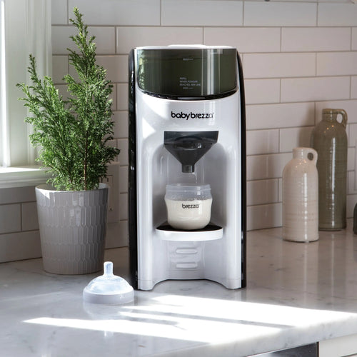 Front view of Formula Pro Advanced placed on a kitchen counter, showcasing its sleek design and compact size. - product thumbnail