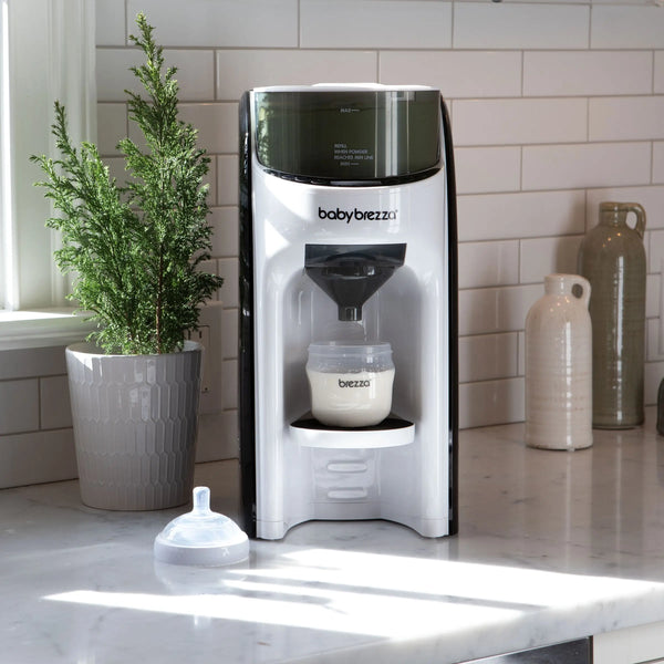 Front view of Formula Pro Advanced placed on a kitchen counter, showcasing its sleek design and compact size. - product thumbnail