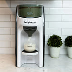 Front view of Formula Pro Advanced placed on a table with decorative miniature plants in the background, showcasing its modern design - product thumbnail