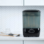 Baby Brezza SDA Premium Black with a bottle and nipple on kitchen countertop - product thumbnail