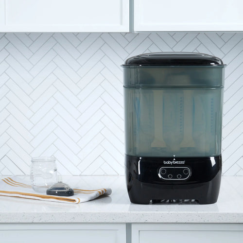 Baby Brezza SDA Premium Black with a bottle and nipple on kitchen countertop - product thumbnail